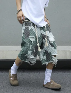 Shorts vaqueros holgados de algodón para hombres con bordes deshilachados y descosidos S - Shein - FashionsVida
