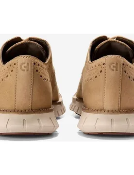 Zapato oxford de hombre de punta de ala tradicional en nobuck - Cole Haan - FashionsVida