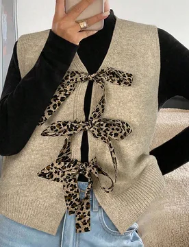 Chaleco de punto con lazo y estampado de leopardo de moda para mujer en otoño L - Shein - FashionsVida