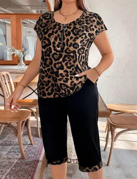 Set casual de 2 piezas: Top con cremallera de manga corta y estampado de leopardo talla grande + shorts con bolsillo, para el verano 2XL - Shein - FashionsVida