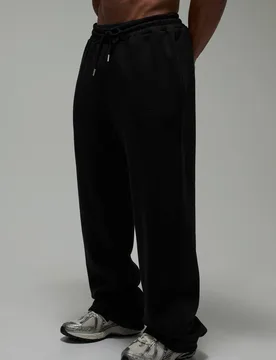 Herren One More Rep Gerade Geschnittene Geprägte Jogginghose Black Größe XS - boohooMAN - FashionsVida
