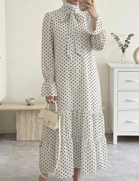 Vestido árabe elegante y modesto para mujer con estampado de lunares, cuello con lazo, manga larga y bajo con volantes, blanco, formal, para vacacion - Shein - FashionsVida
