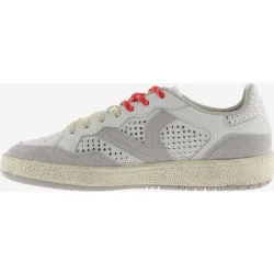 Zapatillas deportivas de mujer de piel con tachuelas