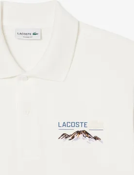 Polo de hombre de minipiqué classic fit con motivo bordado de manga corta - Lacoste - FashionsVida