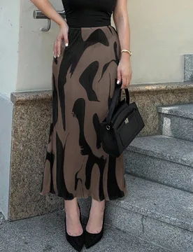 Falda con estampado todo sobre y dobladillo de cola de sirena, falda larga de corte regular y cintura alta con volantes, estampado integral marrón pa - Shein - FashionsVida