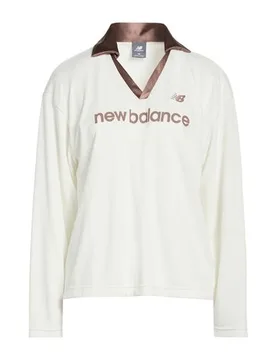 Polo Mujer Marfil XS Mujer - New Balance - FashionsVida