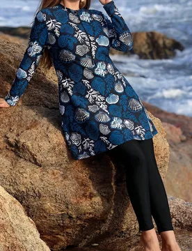 Conjunto burkini de talla grande con top de manga larga y pantalones con estampado de conchas marinas para vacaciones de verano en la playa 2XL - Shein - FashionsVida