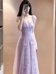 A long elegant and gentle purple halter dress