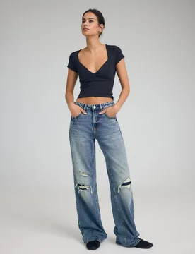 D92 Jeans im Straight-Wide-Fit IM STÜCK GEFÄRBTER DENIM-WASHED-LOOK 34 - Stradivarius - FashionsVida