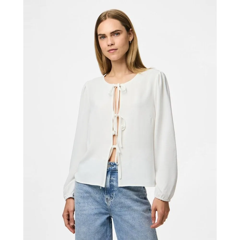 Top de manga larda y lazos de mujer - Pieces - FashionsVida