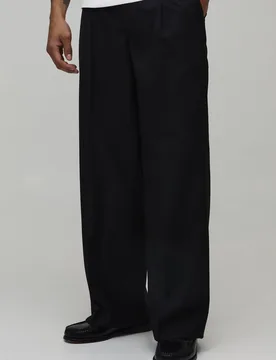 Herren Weite Anzughose Mit Bundfalten Im Baggy-Schnitt Black Größe 30 - boohooMAN - FashionsVida