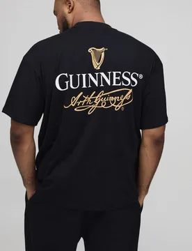 Herren Plus Schwarzes Oversized T-Shirt mit verlängertem Ausschnitt und Guinness Lizenz-Print Black Größe 2XL - boohooMAN - FashionsVida