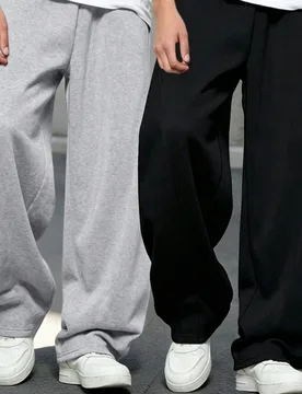 Piezas Pantalones deportivos sueltos y casuales para niños, con cintura elástica, tela suave y cómoda, adecuados para la escuela y el uso diario en - Shein - FashionsVida