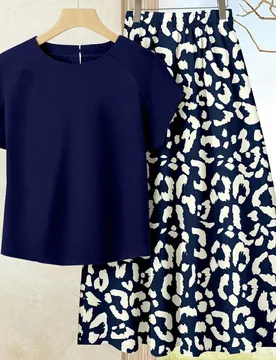 Piezas Conjunto casual de verano para mujer con parte superior de unicolor + falda estampada, Conjunto de verano para mujer, Conjunto de falda y blusa - Shein - FashionsVida
