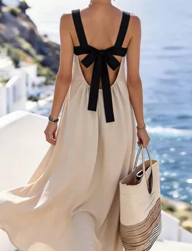 Vestido largo de mujer de nuevo estilo de vacaciones con contraste de color, tirantes finos, espalda descubierta y lazo. Está hecho de tela fluida, c - Shein - FashionsVida