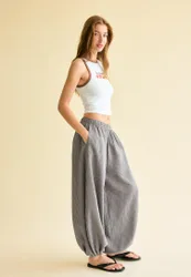 Hose mit Volumen und Karomuster Graumeliert S