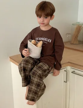 Set de pijama de 2 piezas para niños: Camiseta de manga larga de punto estampada + Pantalón de cuadros tejido, para otoño 6Y - Shein - FashionsVida