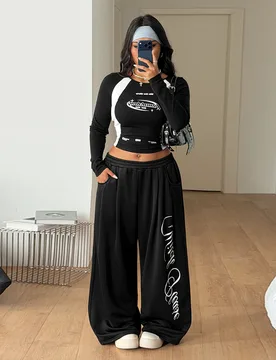Pantalones de chándal negros de cintura media, pierna ancha, cintura elástica, holgados, con gráficos, estilo vintage, casual, para salir, gimnasio - Shein - FashionsVida