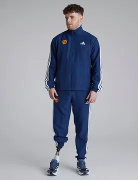 Manchester United x Essentials 3-Stripes Woven Tracksuit Blue S - Adidas - FashionsVida