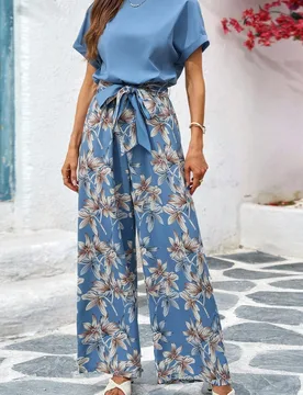 Mono elegante de cuello redondo con cinturón de cintura y pantalones anchos con estampado floral a juego para mujer, conjunto de verano para resort y - Shein - FashionsVida