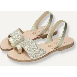 Sandalias planas de mujer en piel