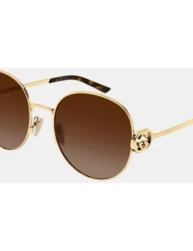 Gafa de sol de mujer ovalada metalica con lente degradada - Gucci - FashionsVida