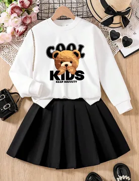 Conjunto de niña preadolescente con camiseta de manga larga de cuello redondo estampada de dibujos animados y falda plisada sólida 12Y - Shein - FashionsVida