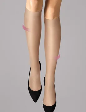 Minimedia semitransparente ligeramente brillante - Wolford - FashionsVida