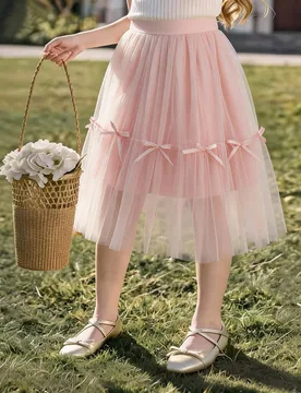 Falda de tul de ballet de color rosa de longitud media con decoración de lazo y malla esponjosa en capas, adecuada para fiestas, actuaciones y salida - Shein - FashionsVida