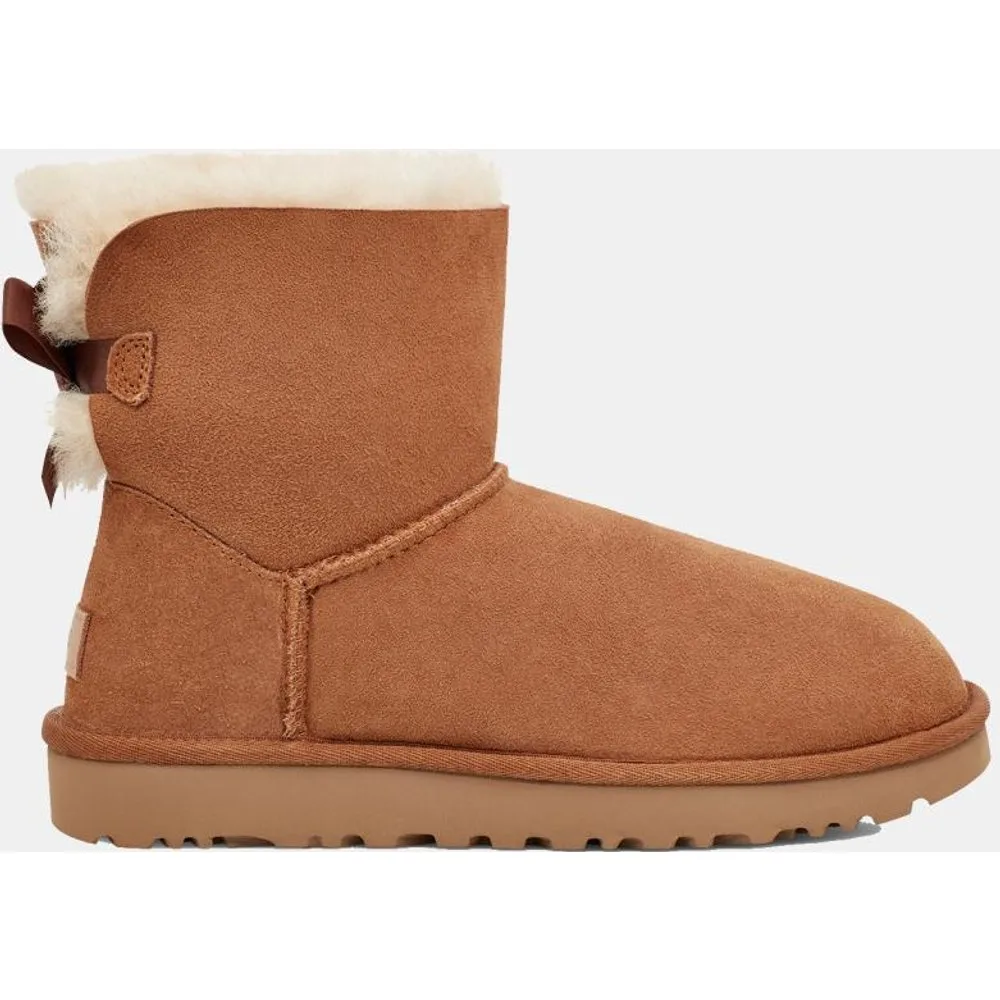 Botín plano forrada pelo classic mini bailey bow de mujer - Ugg - FashionsVida