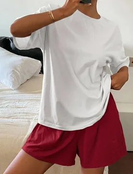 Conjunto de 2 piezas de camiseta de manga corta holgada y pantalones cortos de pijama de unicolor para mujer, ropa de estar en casa XL - Shein - FashionsVida