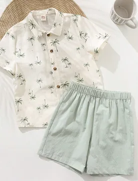 Set de 2 piezas compuesto por un cárdigan de manga corta con cuello y estampado de palmeras, y un short de cintura elástica para niñas 6Y - Shein - FashionsVida