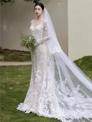 A fishtail long-sleeved light luxury new style welcome gauze dress with small tail for going out