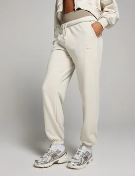 Pantalón deportivo extragrande con tobilleras para mujer de MP - Hueso - M - MyProtein - FashionsVida