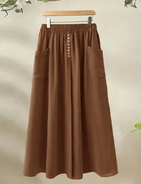 Falda midi de línea A para mujer talla grande, color chocolate liso, plisada, de cintura alta, con detalle de botón y nudo, con bolsillos, casual pa - Shein - FashionsVida