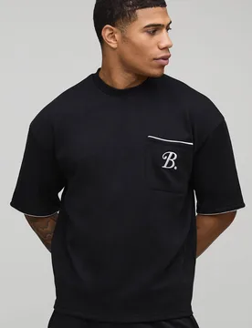 Herren Oversized Boxy Interlock B Scroll Besticktes Paspel T-Shirt Black Größe XS - boohooMAN - FashionsVida