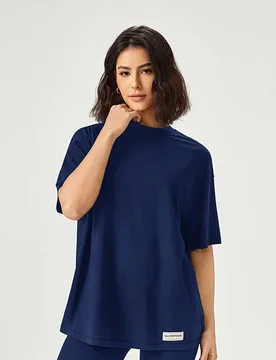 Camiseta unisex de manga corta, cuello redondo y talla grande de algodón pima para uso diario y casual - Shein - FashionsVida