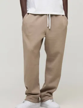 Herren Basic Baggy Jogginghose Mit Tiefem Schritt Taupe Größe Small - boohooMAN - FashionsVida