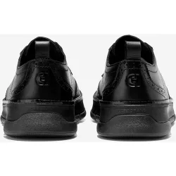 Zapatos de cordones de mujer confeccionados en piel