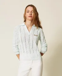 Pull polo avec torsades et broche