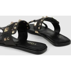 Sandalias planas de mujer en piel con tachas