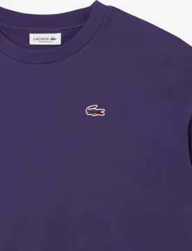 Camiseta de mujer de corte holgado con cocodrilo con paisaje en morado de manga corta - Lacoste - FashionsVida