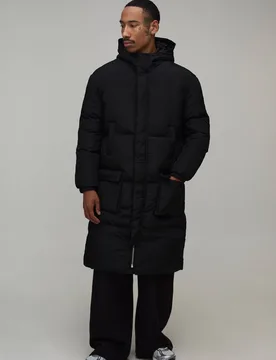 Herren 4-Taschen Lange Kapuzen-Steppjacke Black Größe Medium - boohooMAN - FashionsVida