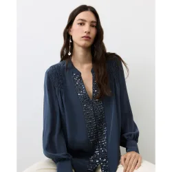 Blusa de mujer con manga larga y abalorios