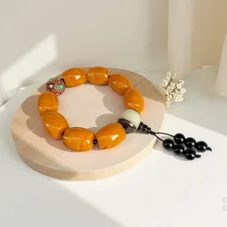 Nepal spacer old , with amber barrel beads, three-way pendant bracelet, single-loop bead