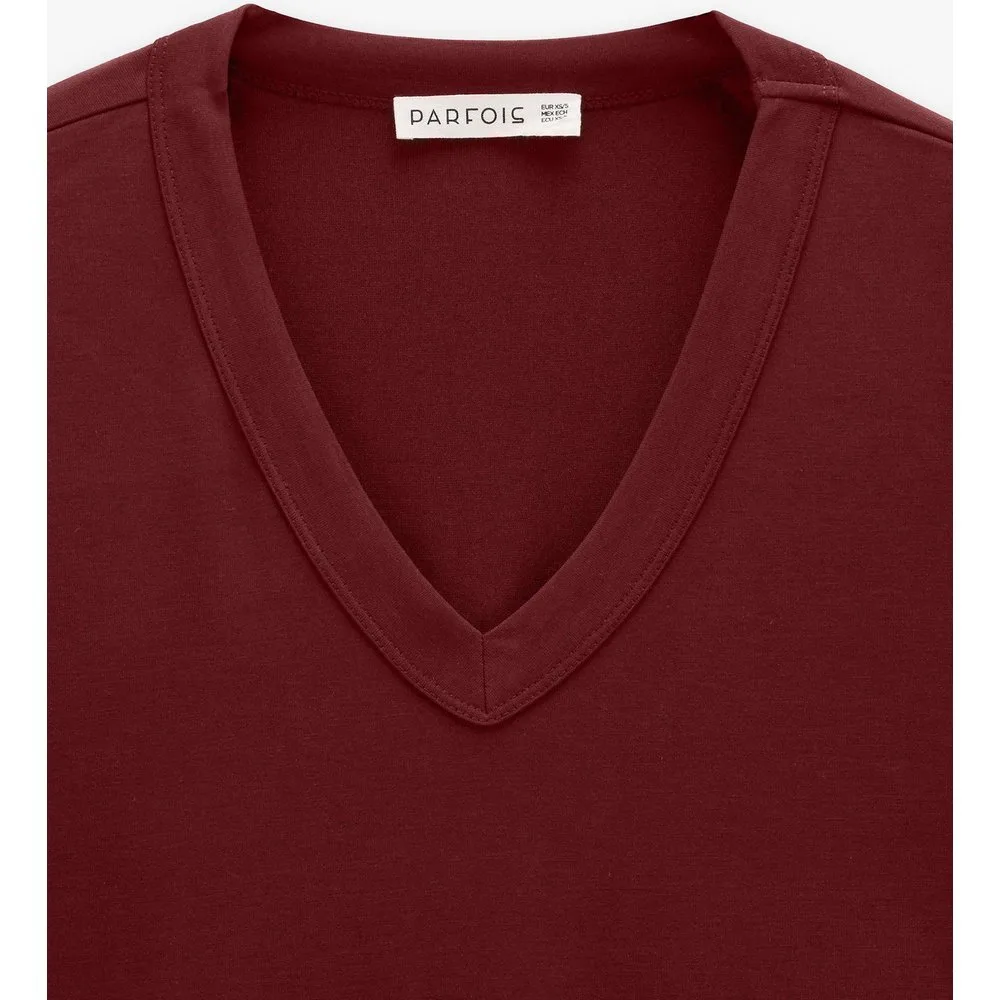 Camiseta de mujer de manga corta con cuello pico en liso - Parfois - FashionsVida