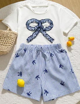 Piezas Conjunto de verano para niñas preadolescentes - Camiseta de manga corta de cuello redondo con lazo decorativo + Pantalones cortos holgados a r - Shein - FashionsVida
