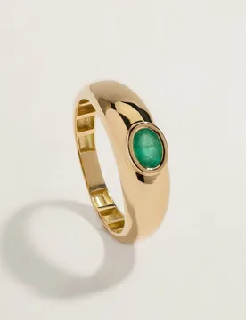 Anillo de oro amarillo de 18k con esmeralda en talla oval de 0.40ct - El Corte Inglés - FashionsVida
