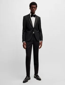 Pantalones extra slim fit de mezcla de lana elástica Hombre - HUGO - FashionsVida