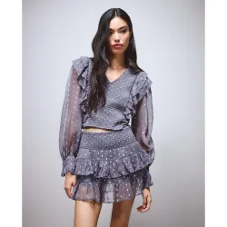Blusa de mujer con volantes y gomas